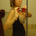 side view w/garment on....see how the lower part sticks out. This photo actually tones it down, but in person it really does look llike Im pregnant.....