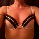 With a bra on