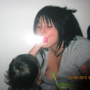 This is me AFTER I had my daughter.. She is 10 months in pic. shoving a sucker in my mouth <lol>