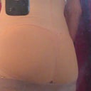 No need to take it off the open area extends the entire genital area so youdont have to worry about soiling or removing for potty which is great since I go very frequently. It has rear cut outs so it doesnt flatten your hiney.