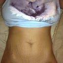 My flat belly... doesn't look so bad laying flat.  Except I haven't had a belly button in 10 years!