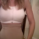 8 days post op. This is the compression sports bra I love. www.prettier.com is the website on the tag. I bought it at Dillards. I am also wearing spanx slim cognito. I will take pictures of my body without compression garments when I purchase new lingerie. None of my regular old bras fit and I didn't want to get any new ones until my both of my breasts settle. Swelling seems to be gone but the left one has not dropped completely.