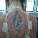 With numbing cream/plastic wrap