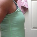 Right side in a sports bra & tank top