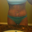 Day 16! I'm not bruised, just bad lighting. And I have a plug in my belly button to make sure it doesn't get too small.
