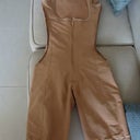 I had my garment taken in by a seamstress in the waist area.  This should make it fit more like a small in the middle but a roomy XL in the butt.  I'm being very careful not to squeeze my butt and make sure it has plenty of room.