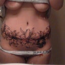 tattoo cover up of scar and old tattoo on front hip. Got the outline and shading done last night and return in 12 days to get coloring done. Scar is taking color well..Yeah!