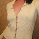 I little sweater I bought but couldn't wear because my breast pulled at the buttons too much. Now it fits!