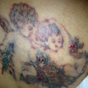 More clear shot- I'll take an updated photo in 2 weeks once it heals and the ink lifts a bit more.