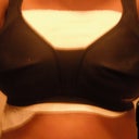 After a few days, wearing a sports bra over the bandadges that were supposed to "form" my breasts