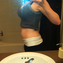 I was 5 weeks pregnant here but this illustrates the lower ab bulge that I had from the distasis recti.  What you cannot see is the squishy/hanging skin when I would bend over.