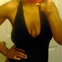Taken late 2011...  My breasts don't sit UP or IN even in a halter onesie!  Lol