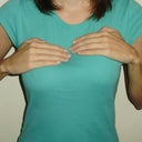 My hands are resting on the tops of each implant.