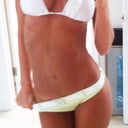 Little bit of scarring in the middle right above bikini bottom - that is where my old belly button was!
