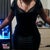 in a body shaper dress and belly trimmer