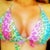 8 weeks out. Unlined, unpadded bikini top. Breasts are getting softer, and incisions have closed. Very pleased :)