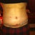 3 weeks, 3 days.  Much less swollen! Belly button is starting to sink in more and the opening is SO much smaller.  Finally, some positive changes!
