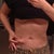 Me pinching fat on the left side of my body.