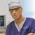 John E. Sherman, MD