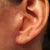 Left ear with bubble and pixy ear