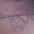 scar 1 year later just started my tattoo to cover it..i have to get it colored in..but it is still kinda dark but that may be just cause im African american..
