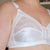 The white patches you can glimpse though the lace is the compress covering the silver bandage.