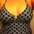 one of my more modest 'tankinis'  this one has just enough "padding" to be modest when you are cold, and so i wore it a lot, because the top gave an illusion of a chest, but now i actually have one with cleavage.