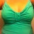 this one is really cute, has a ruffle at the bottom, i love it but before i couldn't do anything but stand up straight in it.  Anything else and it gapped cause the cup was so big that you got to see everything.  Now it fits well.