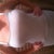 In my undershirt with a bra with no padding. They are so much bigger clothed. ;) this was another image taken for my sisters room mate.