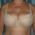 34DDD cup size. Big enough for me to wear as a skull cap.lol