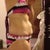 from the side in bathing suit
