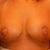 See how they are not the nipples are not the same.  One areola is mound shaped, nipple erect, the other is areloa is flat,nipple flat and not centered.