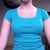 With two bras on - to help adjust mind for sizing.