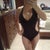 Cute bathing suit I can wear now. Covers belly button and scar.