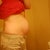 Side view of my very pregnant looking belly.