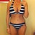 Trying on a bikini to see if the scar is covered (it barely covers)