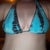favorite swimsuit top. you can see how the right side (your left) hangs lower b/c that breast is the larger one.