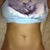 My flat belly... doesn't look so bad laying flat.  Except I haven't had a belly button in 10 years!