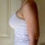 Just under 2 weeks, clothes in a "built in bra" tank (just those elastic band kind)