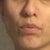 My lips feel so weird, like they're being pulled upwards